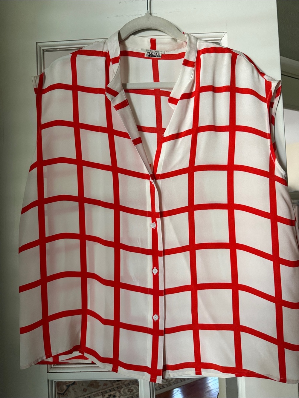 Closed White Sleeveless Button-Front Top with Red Windowpane Check